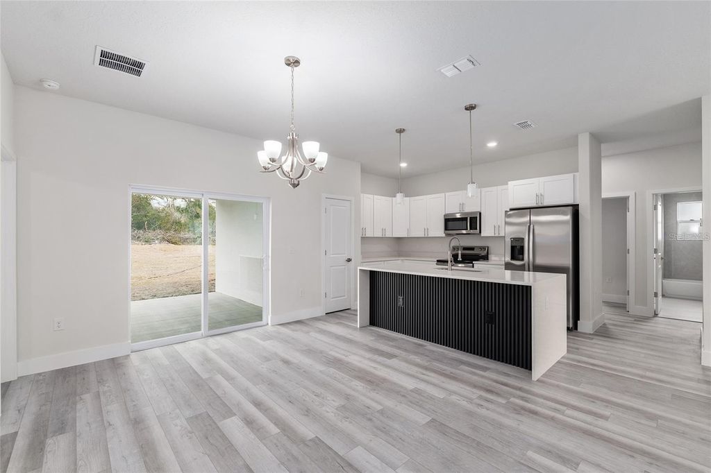 Photo of 16965 SW 50th Circle, Ocala, FL 34473 (MLS # O6387964)