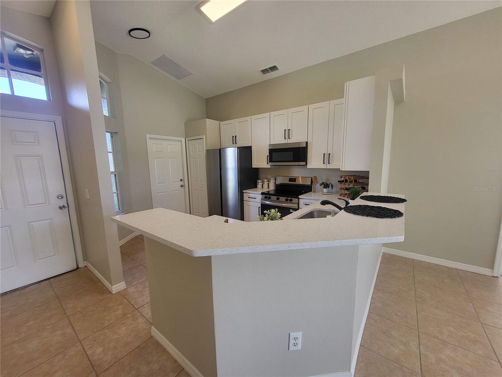 Photo of 5266 Crisfield Court, Orlando, FL 32808 (MLS # O6355563)