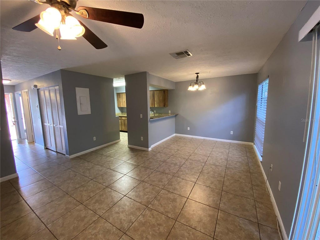 Photo of 9459 Forest Hills Circle, Tampa, FL 33612 (MLS # TB8552016)