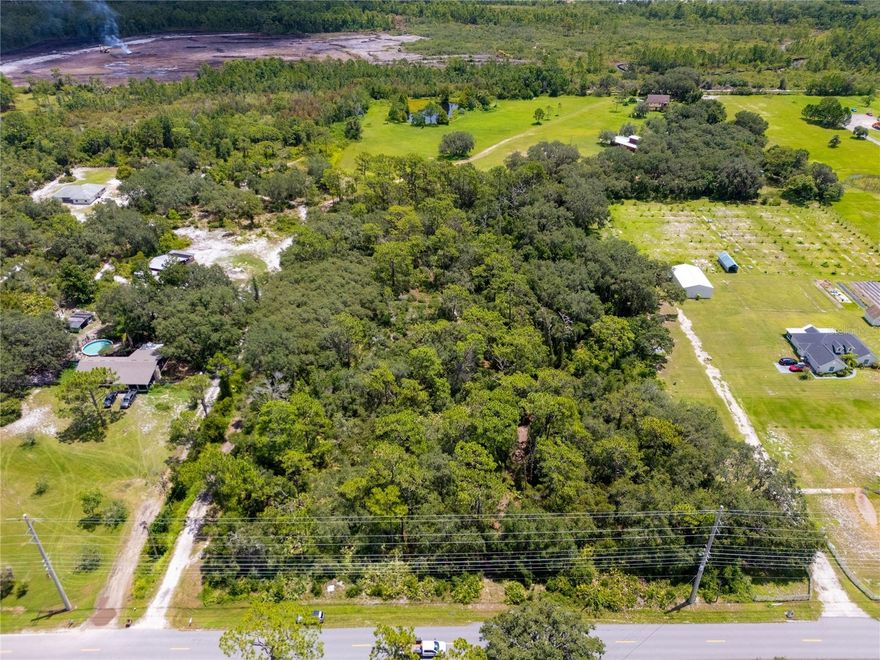 Incredible opportunity to own a little less than 5 ACRES OF BUILDABLE LAND in one of Central Florida’s fastest growing corridors! Located just 10 minutes south of Lake Nona’s Medical City, this prime St. Cloud property sits near the heart of major development including Sunbridge, Weslyn Park, Preston Cove, and Roan Bridge. The area is experiencing explosive residential and commercial growth, making this a strategic investment for developers, builders, or those looking to create a custom estate. Utilities are located nearby, and the land is ready for your vision. Whether you're planning a small residential enclave, luxury custom homes, or seeking a long-term land hold in a rapidly appreciating area, this parcel delivers location, scalability, and opportunity. With easy access to the 417, Turnpike, and Orlando International Airport, this location supports both commuter convenience and high end living potential. Demand in this area is surging, and land opportunities of this size and proximity to Lake Nona are becoming increasingly rare. Don't miss your chance to secure a valuable piece of the future in one of Florida’s most active growth markets.
MORE PICTURES COMING SOON! Reach out today to walk the property and explore the possibilities!