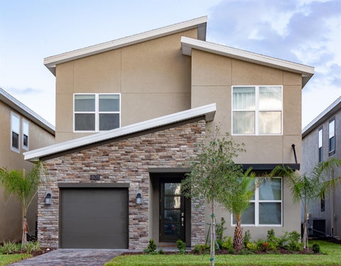 Photo of 801 Drop Shot Drive, Davenport, FL 33896 (MLS # O6448224)