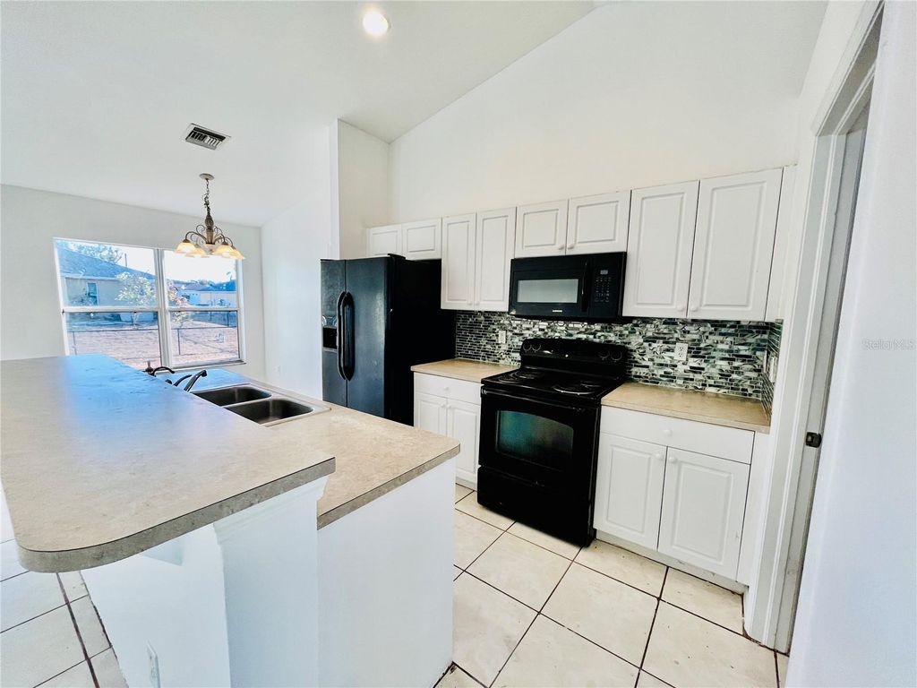 Photo of 4913 Beauty Street, Lehigh Acres, FL 33971 (MLS # TB8476850)