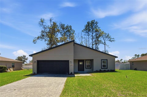 Photo of 12797 SW 58th Circle, Ocala, FL 34473 (MLS # O6451925)