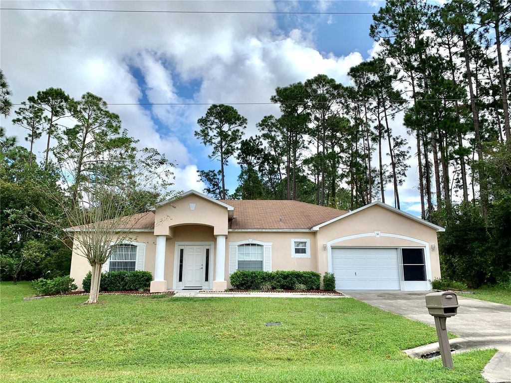 Photo of 94 Breeze Hill Lane, Palm Coast, FL 32137 (MLS # FC312369)