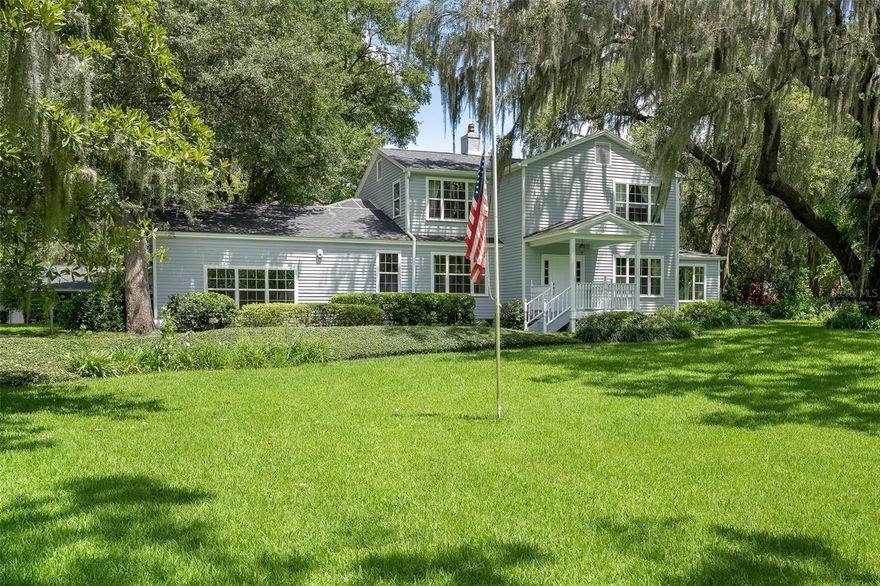 One or more photo(s) has been virtually staged. Silver Lake Waterfront Estate – First Time Ever Offered! This extraordinary Silver Lake waterfront estate is being offered for the first time and presents a rare opportunity to own a true legacy property. Nestled on 2.15 acres with 177 feet of pristine lake frontage, the property includes a spacious two-story main residence with over 4,985 square feet of living space, as well as a detached 700 sq ft guest house with multiple hobby and workshop rooms. The main home features 4 bedrooms and 3.5 baths, with elegant formal living and dining rooms showcasing hardwood floors, built-in shelving, and a wood-burning fireplace. At the heart of the home is a beautifully designed kitchen offering granite countertops, abundant cabinetry, a gas range, double ovens, pantry, and convenient pass-throughs to both the sunroom and family room. Adjacent to the kitchen is a large tiled breakfast area and family room with French doors leading to the side yard, along with a 33x11 sunroom filled with windows and French doors opening to the backyard paver patio. Also on the main level is an 11x9 den/office with rich wood accents, a spacious 20x19 game room with private entry from the carport, a welcoming foyer, and a powder room for guests. Upstairs features brand-new carpet installed in 2025 and two master suites. The primary suite boasts stunning lake views, 2 walk-in closets, a double vanity, and a tiled walk-in shower. The second master suite offers a wall-to-wall closet and private bath with walk-in shower. The third bedroom includes wall-to-wall closets and sliding doors, while the 3rd full bath features double vanities, a pocket door separating the water closet, and a tiled tub/shower combo. A large laundry room with built-in ironing board, cabinet storage, and folding counter completes the interior layout.

Recent updates include a new roof in 2024, attic insulation added in 2023, new ductwork and under-house insulation in 2022, two HVAC units (replaced in 2007), two gas water heaters (one replaced in 2016), all new windows, new drainfield installed in 2012, new well in 2020, along with tank in 2017 and new sprinkler pump in 2020. Outdoor living is elevated by a 20x19 screened paver veranda with vaulted ceilings and an atrium water feature, a 19x19 covered carport with storage closets, and a 32x29 open brick paver patio in the backyard. The detached guest house offers 700 sq ft of living space with a full tiled bath and walk-in shower, a 13x10 hobby room with built-in desk and drawers, a 20x10 workshop with adjoining 13x9 darkroom perfect for hobbies or creative space, and a 13x9 well room housing the water softener. The guest house also features a new roof in 2024, HVAC from 2008, and was replumbed in 2022. The entire estate is beautifully landscaped with majestic oaks, and includes a full irrigation system with pump replaced in 2020. The living square footage includes the guest house. This Silver Lake estate is a rare find offering unparalleled space, comfort, and views—schedule your private tour today.