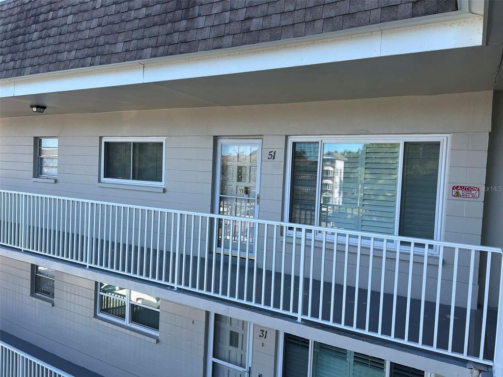 Photo of 2441 Persian Drive #51, Clearwater, FL 33763 (MLS # TB8452295)