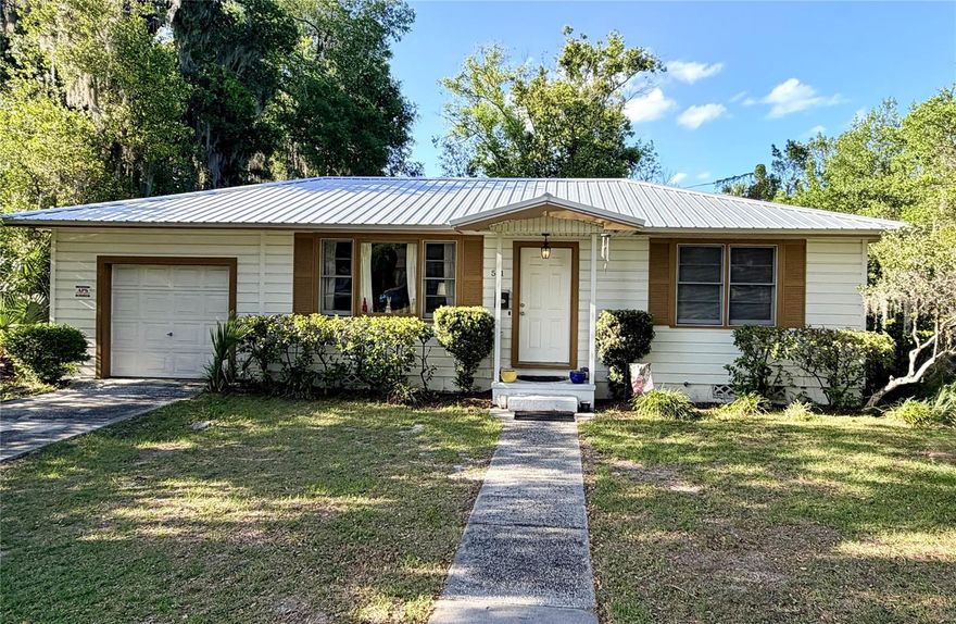 DELAND! This charming 1954 home is located just minutes from Stetson University, offering a rare opportunity in one of DeLand's most desirable areas. Nestled under mature trees, this well-maintained property features an easy layout, large fenced yard with a deck and classic character, including an original kitchen that has been thoughtfully preserved.  With close proximity to campus, downtown DeLand, dining and local shops, the location alone makes this property a standout. Ready for its next chapter, this home offers both charm and potential in a prime setting.  *** All information in the MLS Listing is thought to be accurate but not guaranteed***