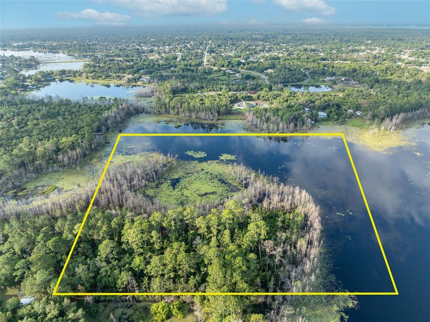Picture your dream home nestled in the heart of Deltona, Florida, known as the "bedroom community" for its serene and idyllic environment. This stunning vacant land spans 11 acres  with 2.5 buildable acres and offers the rare luxury of lakefront living, making it the perfect canvas for your future residence. Enjoy breathtaking views and tranquil mornings by the lake, right from your backyard. Deltona boasts numerous parks, ideal for family outings, picnics, and enjoying the great outdoors. Experience the amenities of being in the largest city in Volusia County, with a charming small-town feel. Golf at the famous Deltona Club, Perfect your swing at the renowned Deltona Club, a premier golf destination. Explore Lyonia Environmental Center and get closer to nature with educational exhibits and walking trails through preserved scrub habitats. Join the community in celebrating local culture with music, food, and fun activities. A short drive away, this park offers swimming, scuba diving, and a chance to observe manatees in their natural habitat. Enjoy quick trips to the famous Daytona Beach, known for its vibrant atmosphere and pristine sands. buildable amount