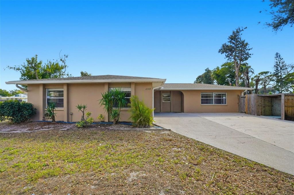 Photo of 2305 26th Avenue W, Bradenton, FL 34205 (MLS # O6365763)