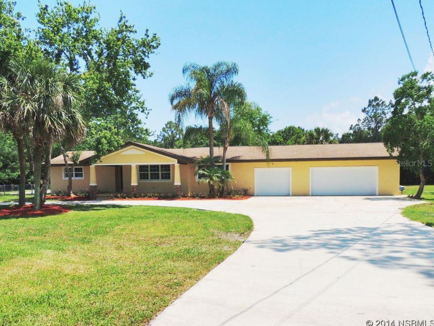 Extensively remodeled pool home on almost 2 acres! Enjoy the country life in this four bedroom two and half bath home that boasts brand new windows, electrical, plumbing, septic & well , 2 A/C units & pool equipment. The room count includes an eat in kitchen that is graced with granite counter tops, wood cabinets, 42 inch upper cabinets, stainless steel appliances, family room, living room that conveniently accesses the pool deck. The huge master retreat is finely appointed with his and her walk in closets, beautifully updated bath with double vanity topped with exotic granite and a walk in shower & sliders leading to the pool deck. Nice sized guest bedrooms and a granite topped double vanity in the guest bath. This home also features extensive use of wood flooring, new tile, carpet & paint. The outside features a sparkling pool with brick paver pool deck and circular drive perfect for entertaining. Square footage received from tax rolls. All information recorded in the MLS intended to be accurate but cannot be guaranteed.