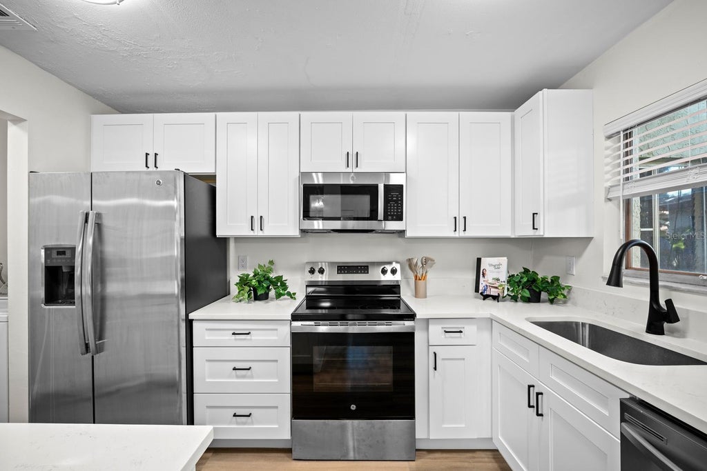 Photo of 2922 Lichen Lane #A, Clearwater, FL 33760 (MLS # TB8557928)
