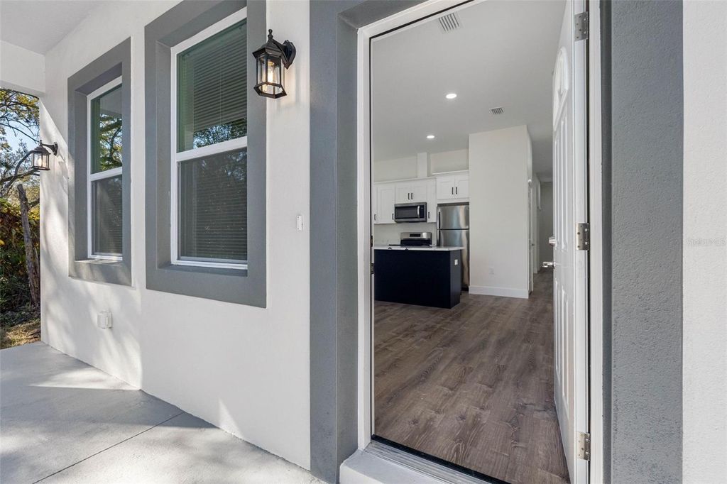 Photo of 10247 Lake Drive, New Port Richey, FL 34654 (MLS # TB8458693)