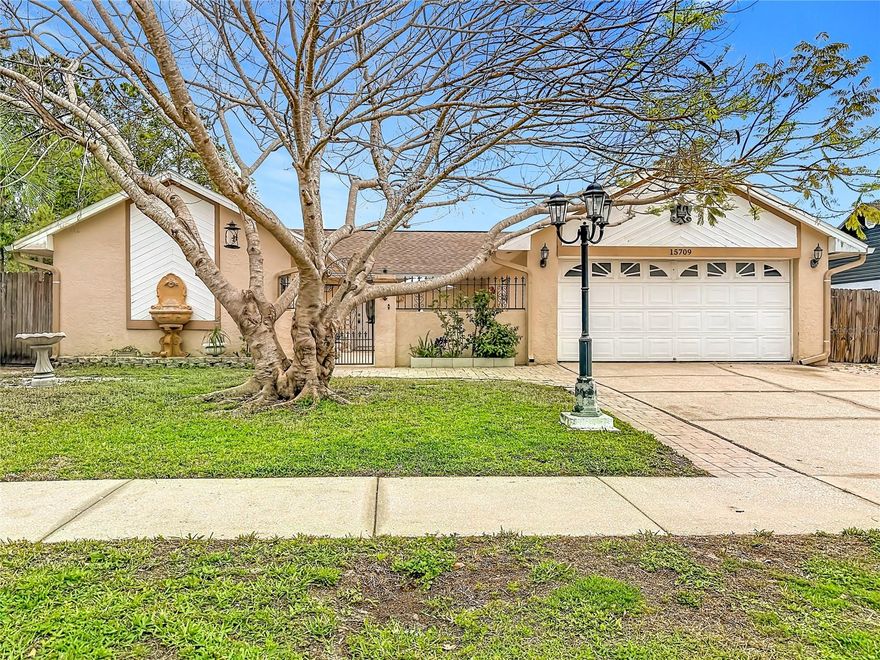 *WOW, SELLER REDUCED THE ASING PRICE BY $15,000.* Welcome to your Perfect Florida Retreat quietly nestled in the HIGH DEMAND neighborhood of Countryside!  This thoughtfully designed 3 bedroom, 2 bathroom home is a sure to please.  You and your guests will enjoy the courtyard complete with pavers, entertaining space and double entrances to your home.  Enter the sun-filled foyer and notice the open feel of this home.  The Great Room features a vaulted ceilings, and French double doors that lead to the private fenced yard.  The kitchen features newer stainless steel appliances, including propane for the gas range, a center island and pantry.  There is a formal dining room adjacent with double doors to the front courtyard. This home has a very open feel for the entertainers delight. The private Primary bedroom features a walk in closet, ample room for a king sized bedroom set, a private bathroom complete with BIDET, and 2 person shower all with custom tile work. There are 2 additional bedrooms, and a full secondary bathroom.  Outside- you have room for a pool.  The yard is fenced with PVC fencing adding to the privacy.  There is a parking space for an RV, Boat, or whatever else you are bringing. Brand New HVAC with transferrable warranty installed today 4.6.2026.