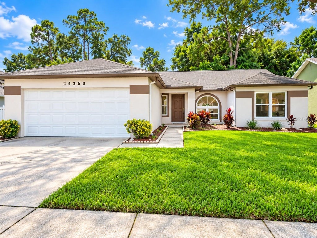 Photo of 24360 Twin Lake Drive, Land O Lakes, FL 34639 (MLS # TB8551600)