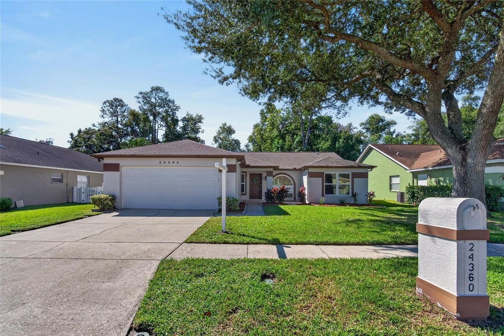 Photo of 24360 Twin Lake Drive, Land O Lakes, FL 34639 (MLS # TB8551600)