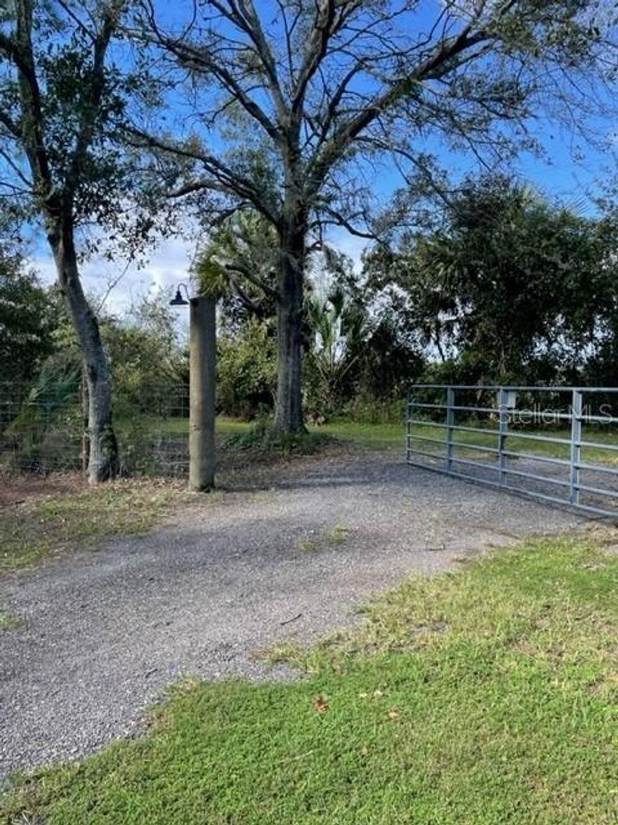 If you truly like country living, then this is the lot for you.  Large secluded lot off of County Road 2006, close to Haw Creek Preserve, and the fish camp.  Already cleared, beautiful open space for you to let your mind wander with desire to build on this spacious piece of paradise.