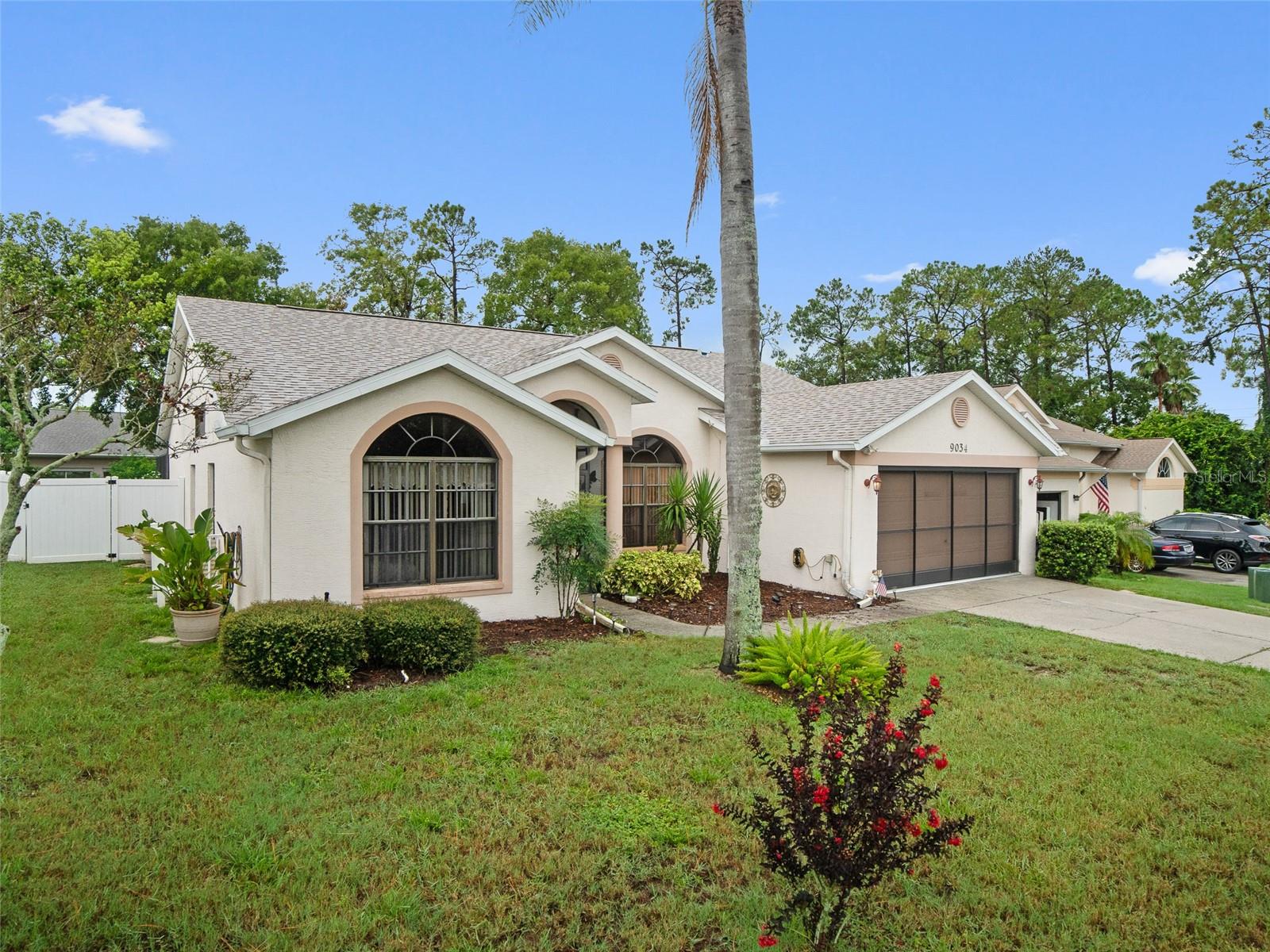 Welcome to this spacious 3BR/2BA pool home located on a quiet cul-de-sac in the desirable Fairway Oaks community of Hudson. With 1,989 sq ft of living space and a new roof installed in 2024, this home offers comfort, functionality, and peace of mind.
Step inside to a bright, open layout with high ceilings and plenty of natural light. The formal living and dining areas greet you at the entrance—perfect for entertaining. To the left, the primary suite features two walk-in closets and a spacious en-suite bathroom with dual vanities and a relaxing garden tub. A second bedroom is located nearby—ideal for guests or a home office.
On the opposite side of the home, you’ll find an open kitchen with a breakfast nook that flows into the cozy family room. Bedroom three and the second full bathroom are located just off this space, offering a great layout for privacy and flexibility.
Step outside to enjoy the large, enclosed lanai and screened-in pool, perfect for year-round Florida living. The backyard is completely fenced and offers plenty of space for pets, play, or gardening—plus peace of mind and privacy.
Fairway Oaks is a quiet, established neighborhood with convenient access to US-19, shopping, dining, medical facilities, and the Gulf coast.
Don’t miss this opportunity to own a well-maintained pool home with a spacious fenced yard and thoughtful layout—schedule your private showing today!