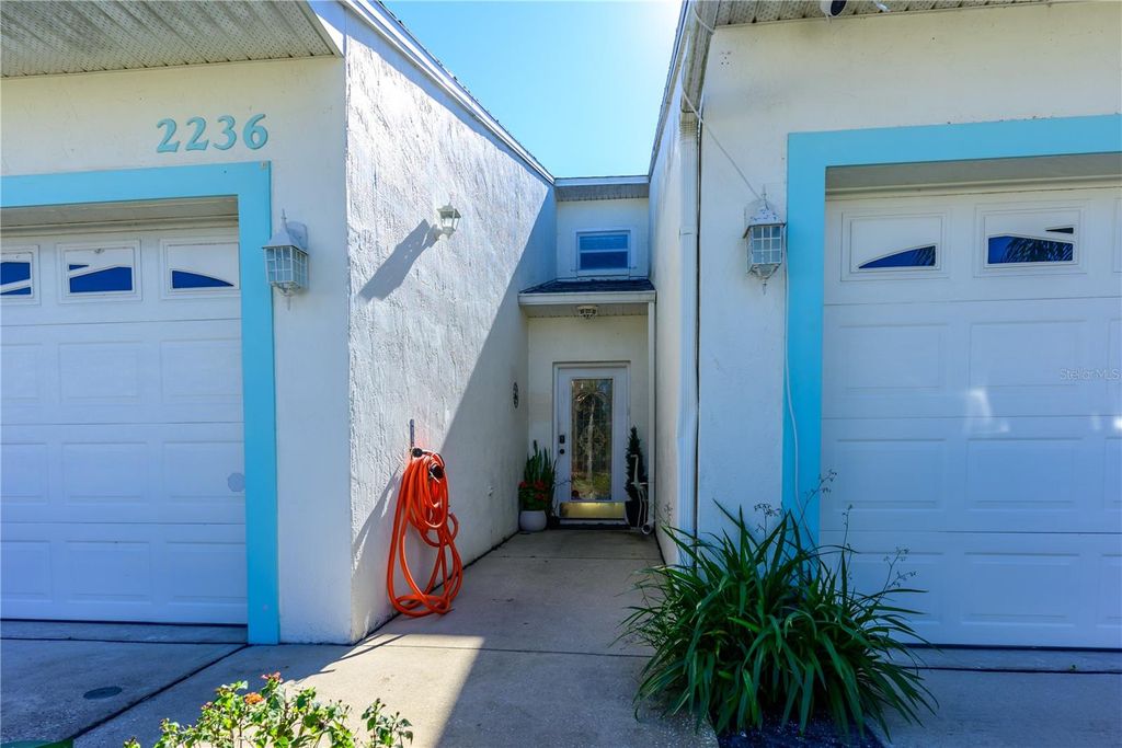 Photo of 2236 Deerwood Drive, New Smyrna Beach, FL 32168 (MLS # OM716006)