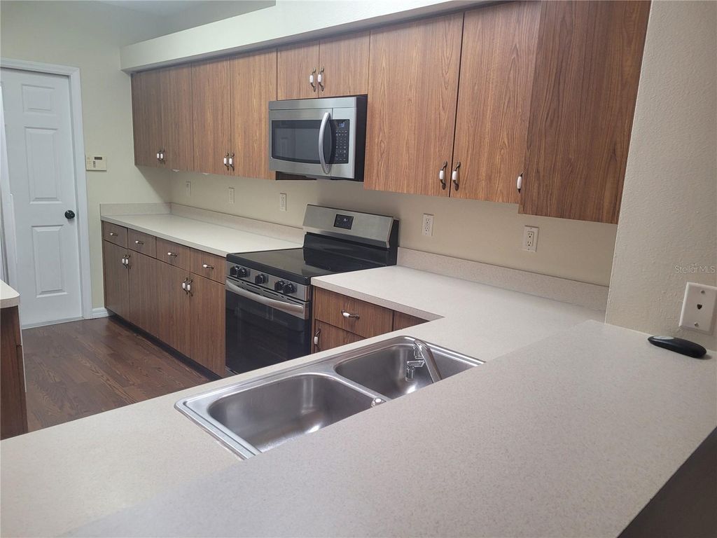 Photo of 715 Cypress Park Avenue, Tarpon Springs, FL 34689 (MLS # W7884870)