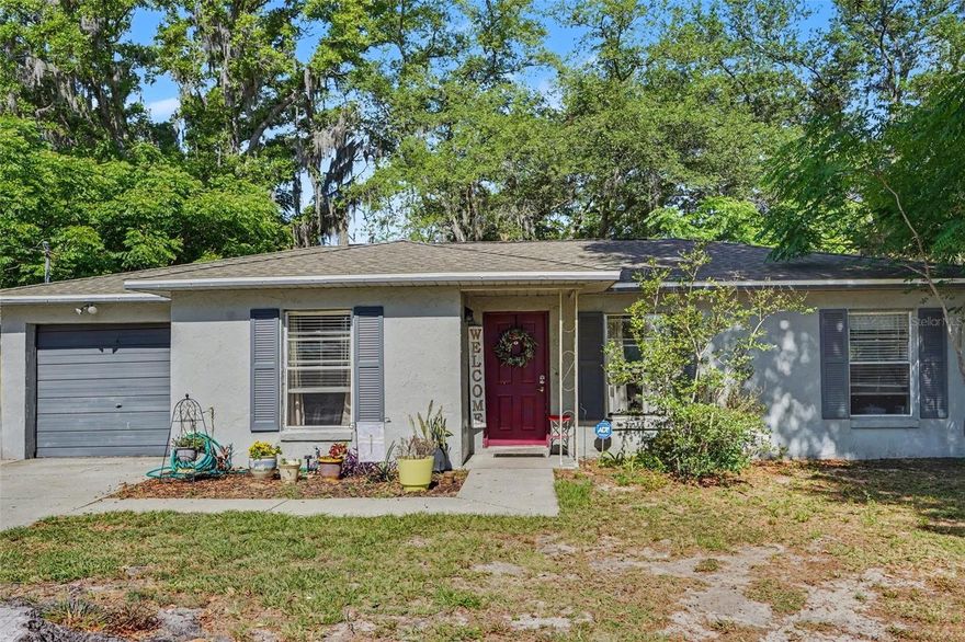 This charming 3-bedroom, 1.5-bath home sits on over half an acre, offering plenty of space and privacy. The fully fenced backyard is perfect for outdoor living and includes a large shed, a quaint treehouse, and electrical hookups for an RV. Enjoy relaxing in the screened-in, covered lanai—ideal for year-round use. The roof is just 3 years old, providing peace of mind for years to come. With no HOA or CDD fees, this property offers both freedom and value. A wonderful opportunity to own a spacious, well-equipped home with room to grow! Seller offering 10k towards buyers closing costs or any updates that they would like to make.