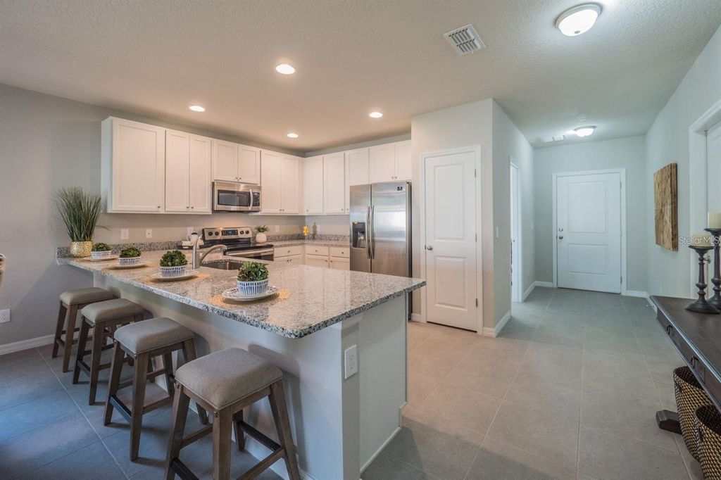 Photo of 956 Derbyshire Drive, Kissimmee, FL 34758 (MLS # S5135683)