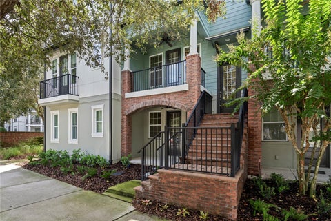 Photo of 128 Boardwalk Avenue, Oviedo, FL 32765 (MLS # O6439663)