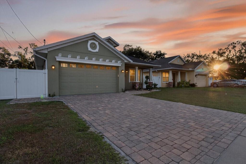 Photo of 812 W Country Club Dr, Tampa, FL 33612 (MLS # TB8441025)