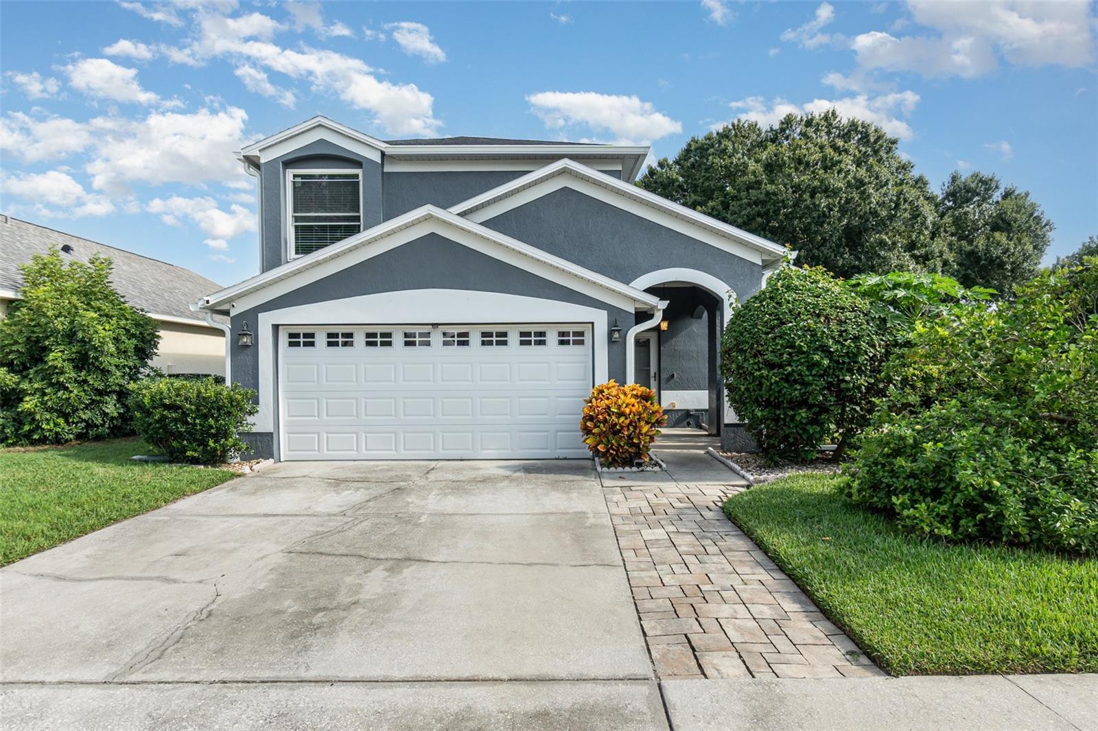 Beautifully updated 3-bedroom, 2.5-bath pool home in the desirable Dunhill community of Oviedo. This move-in ready property offers nearly 2,200 sq. ft. of living space with extensive upgrades throughout. Major improvements include roof and gutters (2023), HVAC (2016), replumb (2006), water heater (2023), kitchen remodel (2022), bathroom remodel (2023), new flooring (2022), interior paint (2023), and exterior paint (2025). Energy-efficient features include Low-E windows and French door (2020), a 17.6kW paid-off solar system, and dual Tesla Powerwalls (2020) for backup power.
The backyard features a custom saltwater electric-heated pool with a real rock grotto and waterfall (2015) and a refinished pool deck (2024). Additional highlights include a smart thermostat, Z-Wave light switches, Z-Wave faucet, smart irrigation, and low HOA fees ($51/month) that include a community pool, tennis court, and a basketball half-court. Conveniently located near UCF, Research Park, Oviedo Mall, 5 minutes from Oviedo on the Park, shopping, dining, and major highways. Zoned for highly rated Seminole County schools: Evans Elementary, Jackson Heights Middle, and Oviedo High.