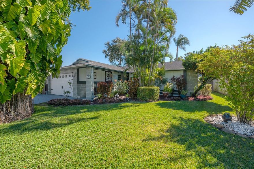Discover the perfect blend of comfort, convenience, and Florida living in this beautifully maintained 3-bedroom, 2-bath pool home in the sought-after Bonnie Glynn neighborhood. From the moment you arrive, you’ll notice the pride of ownership — from the lush, manicured landscaping with custom lighting to the welcoming front porch and spacious lot. Inside, the open layout is ideal for relaxing or entertaining, featuring a nice gala kitchen with granite countertops, stainless steel appliances and easy access to the bright living and dining areas overlooking the sparkling pool. Tile floors flow throughout the main living spaces, while bamboo flooring in the bedrooms adds warmth and charm. Natural light fills each bedroom, creating an inviting and comfortable atmosphere, while a large window in the primary suite offers a beautiful view of the backyard. Step outside through brand-new hurricane-impact sliding doors to your own private retreat, complete with a large pool, separate hot tub, pergola and two storage sheds surrounded by tropical landscaping. The oversized two-car garage includes hanging storage, attic access and laundry hookups, while the side of the home provides additional space for a trailer or small boat. Ideally located just minutes from shopping, dining, beaches and schools, 6809 Sandwater Trail is move-in ready and truly captures the best of Tampa Bay living. Schedule your showing today!