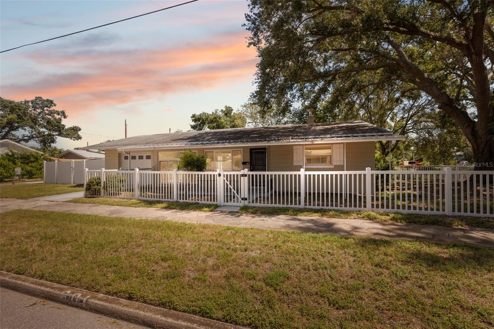 Welcome to this charming 2 bedroom and 1 bathroom home in Central Oak Park, St. Petersburg! Ideally located near beaches, shops, restaurants, breweries, and vibrant downtown St. Petersburg. This move-in-ready home features an updated kitchen and bath, impact windows and no flood insurance required! Enjoy the cozy screened in patio with a fully fenced in yard perfect for families, pets, or entertaining or family time. Schedule your appointment to view this home today. Make it your own before it's gone!