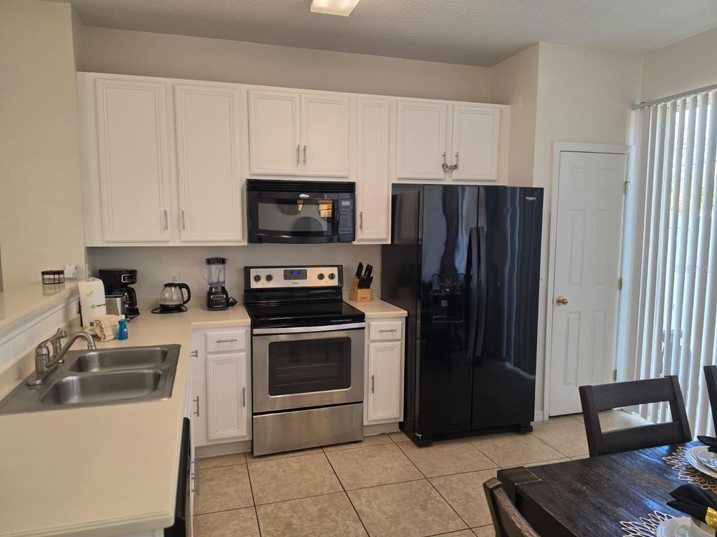 Photo of 5520 Paradise Cay Circle, Kissimmee, FL 34746 (MLS # S5149441)
