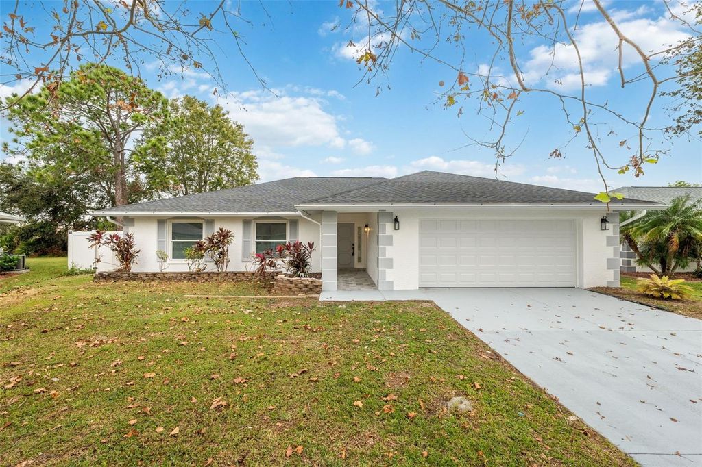 Photo of 1954 Tarpon Court, Wesley Chapel, FL 33543 (MLS # TB8323819)