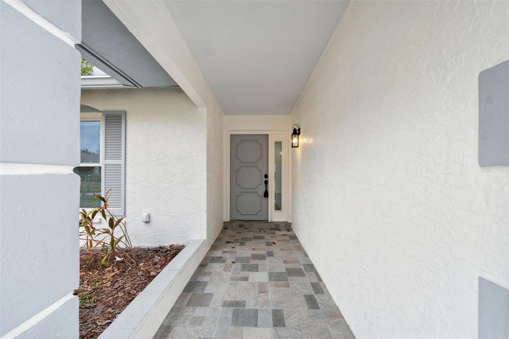 Photo of 1954 Tarpon Court, Wesley Chapel, FL 33543 (MLS # TB8323819)