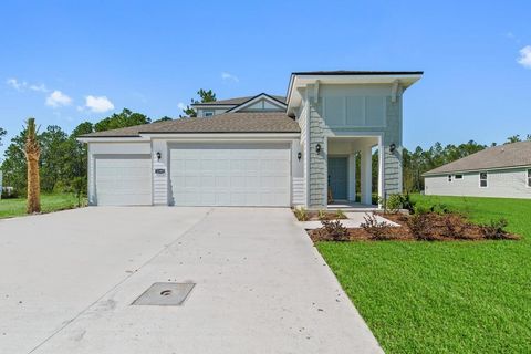 Photo of 1345 Ribbon Place, Palm Coast, FL 32164 (MLS # FC311576) Photo of 1345 Ribbon Place, Palm Coast, FL 32164 (MLS # FC311576)