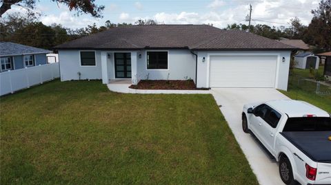 Photo of 20296 Rutherford Avenue, Port Charlotte, FL 33952 (MLS # O6303932)