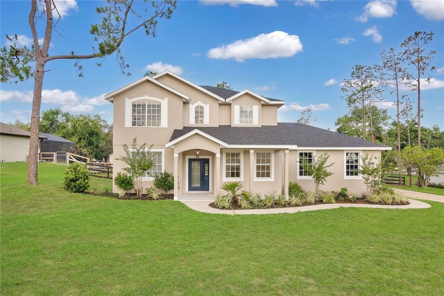 The fully renovated dream home you’ve been searching for is finally here! Set on a generous 0.59-acre lot, this beautifully updated 2-story home, originally built in 2000, features 3 bedrooms and 2.5 bathrooms. With a striking first impression, this home showcases a new roof, new HVAC, new tankless water heater, and fresh exterior and interior paint. Inside, upgrades include luxury vinyl flooring throughout, recessed lighting, light fixtures, and updated door hardware and plumbing fixtures. Step into a bright and open main floor filled with natural light and clean, modern finishes. The living room offers a welcoming space to relax, framed by windows and elegant crown molding. Adjacent to the entry, a versatile bonus space with beautiful natural lighting makes for the perfect home office. The dining room provides an ideal setting for gatherings and dinner parties. At the heart of the home, the stunning kitchen blends function and style with quartz countertops, a showstopping waterfall island with double-sided storage, new soft-close cabinetry, and top-of-the-line Forno and Samsung appliances. A dry bar adds a special touch, while a walk-in pantry and under-stair storage offers smart organization. Conveniently located on the first floor, you’ll also find a half bathroom for guests and a dedicated interior laundry room equipped with a brand new Samsung washer and dryer. Upstairs is the spacious primary suite, featuring tray ceilings and a custom-designed walk-in closet. The primary bathroom has been fully remodeled with elegant tile, a double vanity, modern fixtures, and a large walk-in shower. You’ll find two additional spacious bedrooms that share a beautifully remodeled full bathroom with a modern vanity, updated tile, and sleek fixtures for a polished finish. Step outside to your private backyard retreat, set on an expansive lot with endless possibilities. The covered back patio provides the perfect shaded space for lounging, while the fire pit area offers a cozy spot to gather. The home also includes an attached two-car garage and extended driveway. Located just a short drive from Downtown Montverde, enjoy easy access to local parks, tennis courts, eateries, and the town’s beloved ice cream shop and BBQ spot. The renowned Montverde Academy is also just five minutes away. Call today to schedule your private showing!