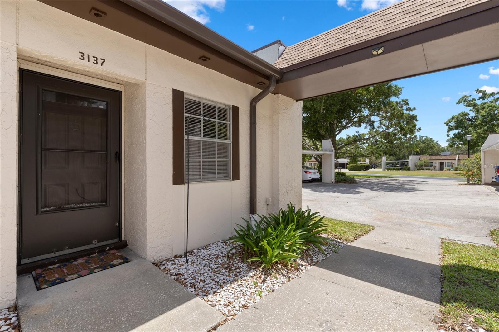 Charming 1-Bedroom End Unit Condo for 55+ buyers with access to 3 Private Golf Courses. This unit includes unlimited Free golf package. Mission Grove in Highland Lakes offers resort-style amenities including heated pools and spa, tennis and pickleball courts, fitness center and classes all in Palm Harbor! Perfect for those looking to enjoy an active lifestyle.
As you step inside, you'll be greeted by a bright and spacious open-concept living, creating a warm and airy atmosphere. The living room flows seamlessly into the dining area and kitchen, featuring updated granite countertops and kitchen—perfect for cooking or entertaining guests. The tranquil bedroom provides a peaceful retreat with generous closet space and easy access to the full bathroom, which boasts modern fixtures and finishes. Step outside onto your patio and enjoy peaceful views of the lush green, or take a short walk over to relax by the pool and screened in lanai.
Come enjoy Florida living at its best in this incredible community! HOA fees include water, sewer, trash, exterior maintenance, roof, cable/ internet and ground maintenance. Additionally, enjoy a tour and scenic ride on one of the communities 24-foot Pontoon boats departing and returning to the dock at the Lodge on Lake Tarpon. Art and crafts are located between the clubhouse and tennis courts for your enjoyment of ceramics, painting, stained glass, woodworking (in a fully equipped shop) and an open studio. RV and boat enthusiasts enjoy parking their RV or boat in a fenced in lot with boat-launch ramp into Lake Tarpon, allowing security and easy access to the water.