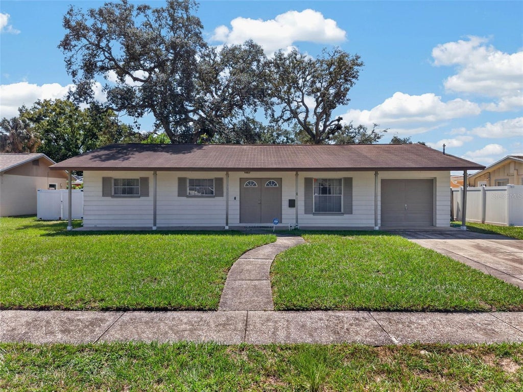 Photo of 3312 W Burke Street, Tampa, FL 33614 (MLS # TB8552689)