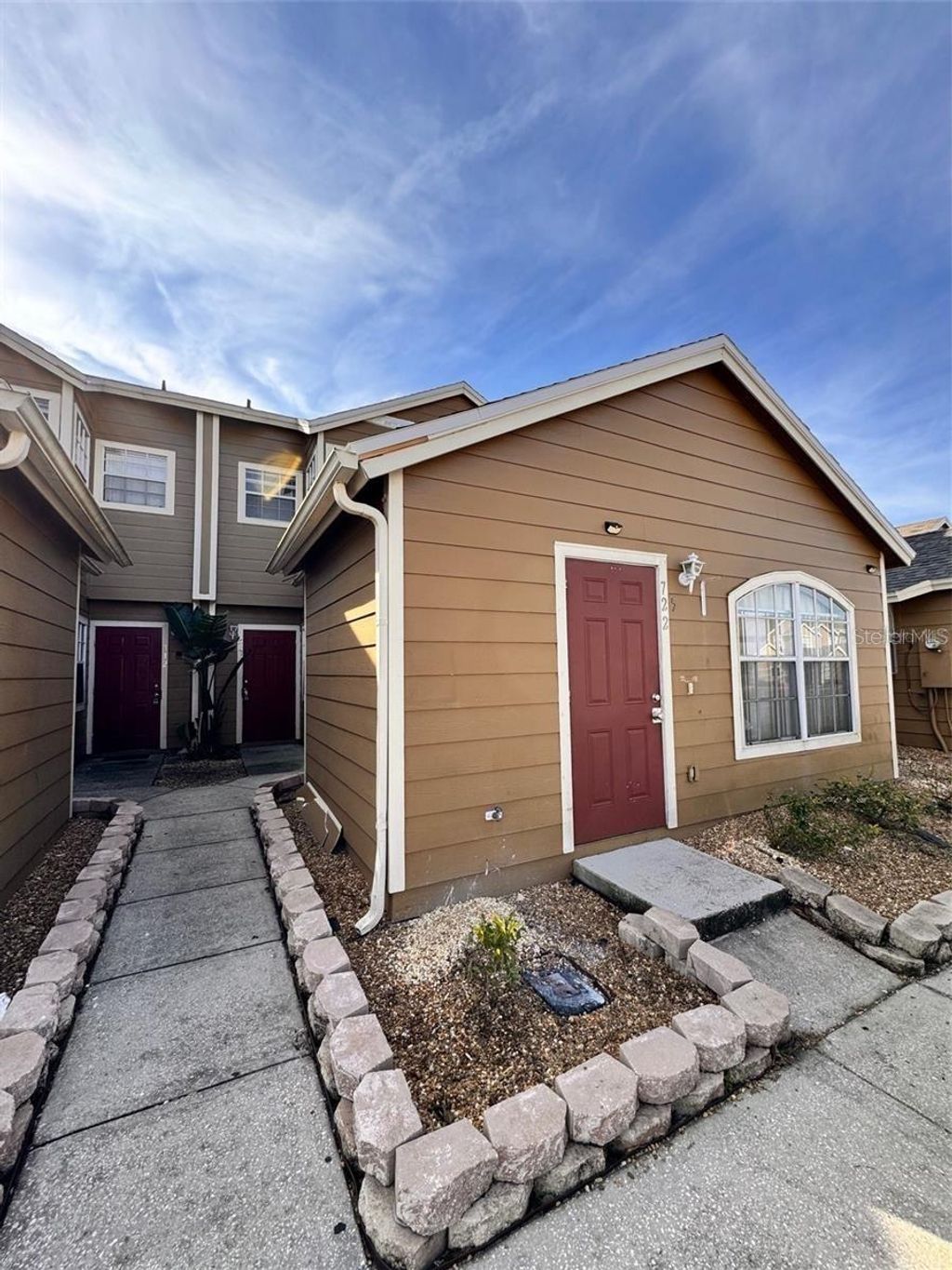 Photo of 722 Washington Palm Loop, Davenport, FL 33897 (MLS # TB8499463)