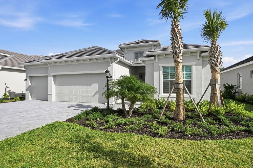 Photo of 5543 Lightning Whelk Lane, Bradenton, FL 34211 (MLS # A4689987)