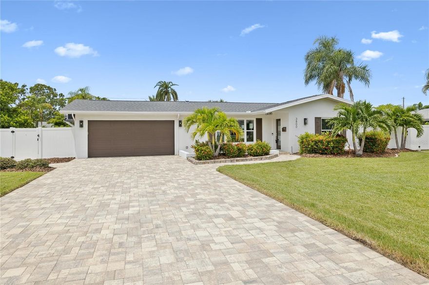 Elegance meets coastal retreat with this completely renovated idyllic 3-bedroom, 3-bathroom residence. Imagine days spent basking in the sun, sand, and surf, then returning to this meticulously designed home that has been fully updated. Upgrades include a new HVAC system - to keep cooling costs down - new pool equipment, wall to wall tile flooring and gorgeous lighting in each room. The Florida-inspired kitchen boasts an oversized island with breakfast bar seating, custom cabinetry and all new appliances. Meticulous detail went into every corner, from the open-concept layout with beautiful tile flooring to the open dining/living room area overlooking the lush backyard and pool. The spacious primary bedroom feels like a spa retreat with soothing colors, large walk-in closets, and a phenomenal en-suite bathroom. The beauty doesn't stop at the front door - walk on through the dining and entertainment areas and you will find this incredible home nestled on a fenced double lot with artisan pavers, a sparkling pool, and a fire pit area; the perfect space for outdoor living and entertaining year round in your own tropical oasis. The oversized laundry room is discreet and functional, accommodating a side-by-side washer and dryer with an abundance of space left for storage. Step into the optional climate-controlled garage with epoxy floor, your haven for your automotive toys and workshop. This stunning home is surrounded by multi-million-dollar estates and located across the street from waterfront residences on Tampa Bay. The home is located minutes from downtown St. Pete which features top rated dining and nightlife and boasts eclectic shopping on Beach Drive. Museums and the Vinoy Golf Club are close by and you're a 15 minute drive to the Beaches. Close to I-275 and all bridges. Florida living doesn't get any better than this!  $175 per month will be added to the rent for pool service and $50 every two weeks for lawn care.