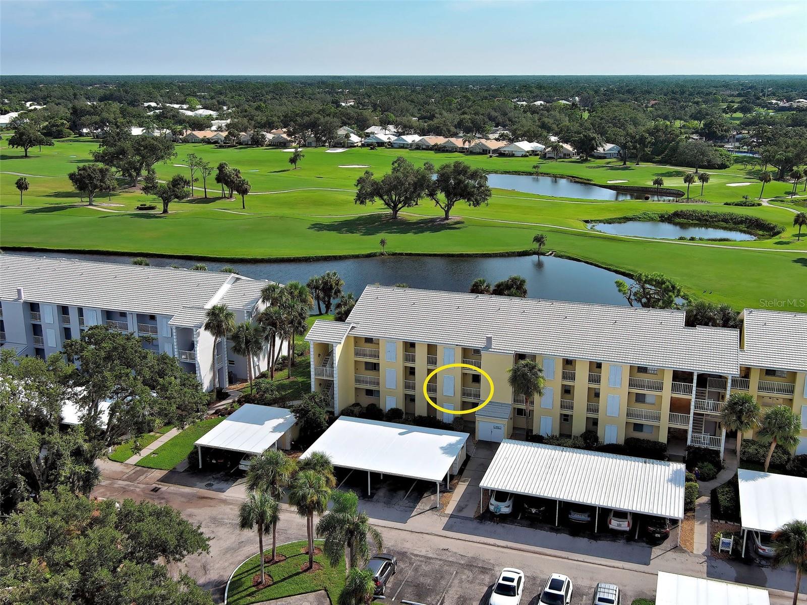Beautifully RENOVATED and FRESHLY PAINTED condo with GOLF AND WATER VIEWS in Westchester Gardens at Plantation. It features a newer HVAC (2023), ENGINEERED HARDWOOD FLOORING (2024) throughout and a spacious COVERED AND SCREENED LANAI with TILE FLOORING, offering serene GOLF COURSE VIEWS with no rear neighbors for added privacy. The kitchen offers WHITE CABINETRY, Frigidaire appliances, and a scenic outlook you'll appreciate while cooking. It blends seamlessly with the bright dining and living areas, from where you can also enjoy the views from the SLIDING GLASS DOORS that flood the space with natural light and lead directly to the inviting LARGE LANAI, perfect for relaxing or entertaining while enjoying the peaceful golf course and water views! The primary bedroom offers DIRECT LANAI ACCESS, stunning views, and an en suite bathroom with tile flooring, a walk-in shower, and a generous walk-in closet. The second bedroom is light-filled and conveniently located next to the guest bathroom, which features a TILED TUB SURROUND and a GRAB BAR for added safety. For added convenience, the laundry closet is tucked away in the primary bedroom and it features newer Frigidaire washer and dyer. This second-floor condo comes with a NEWLY ROOFED CARPORT offering covered parking for one vehicle. There is also a storage space, ideal to keep your belongings. The building exterior was recently painted and the ROOF REPLACED, enhancing both appearance and value. Enjoy effortless access via the community elevator. Whether you're looking for a full-time residence or seasonal retreat, the FLEXIBLE RENTAL POLICY, minimum 30-day lease, offers great versatility. Monthly fees conveniently cover cable TV, high-speed internet, water, sewer, and pest control. There are several different levels of memberships available to join through Plantation Golf & Country Club, to have access to multiple amenities and the Plantation 18-hole golf course. Westchester Garden at Plantation in Venice offers a prime location for enjoying the best of coastal and city living. Just 15 minutes away, residents can relax on the white sands of Venice Beach or look for shark teeth at Caspersen Beach. A short 10-minute drive brings you to Historic Downtown Venice, where charming boutiques, dining, and cultural events create a vibrant atmosphere. For everyday convenience and retail, shopping centers are all within a 10–15 minute radius, offering a mix of local favorites. This community blends tranquility with easy access to beaches, shopping, and the heart of Venice.