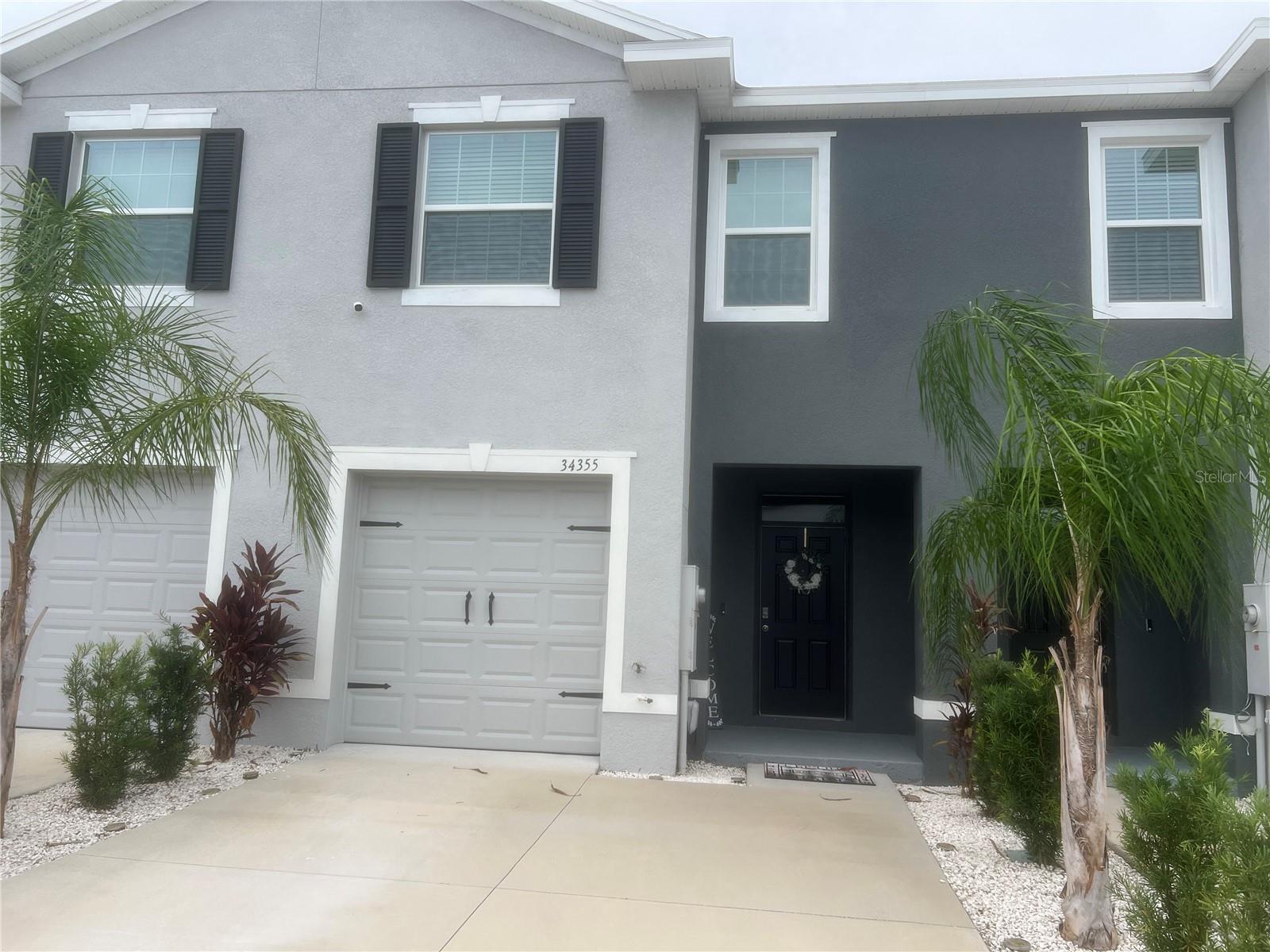 Now available for lease, this beautiful home at 34355 Sorrel Mint Dr, Wesley Chapel is offered at $2,150 a month, with TV, internet, and water included—a rare value. This unit is just like new! This 3-bedroom, 2-bathroom home features a spacious open layout, modern kitchen with ample storage, and an attached garage. Enjoy added privacy with no rear neighbors and a peaceful pond just beyond the backyard. A large covered and screened porch overlooks the serene view, making it the perfect spot to relax or entertain. Nestled in a quiet, family-friendly neighborhood and conveniently located near top-rated schools, shopping, dining, and major highways, this home offers the perfect blend of comfort and convenience.