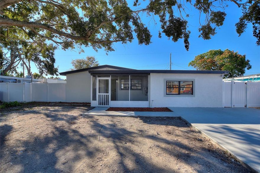 Everything is NEW!! This 4 bedrooms 2 bath house is conveniently  set up as a 3/1 plus and 1/1 Mother-in-Law Suite for extra income. Brand New A/C, Roof, Flooring, Cabinets, countertops, Appliances and more!!!Beautifully remodeled 4-bedroom, 2-bath home offering modern comfort and style. This move-in-ready property features updated finishes throughout, spacious living areas, and a thoughtfully designed layout perfect for everyday living and entertaining. Conveniently located near shopping, dining, entertainment, and major highways, you’ll enjoy easy access to all the great things the Tampa Bay area has to offer. Don’t miss this opportunity to own a stunning home in a prime location.