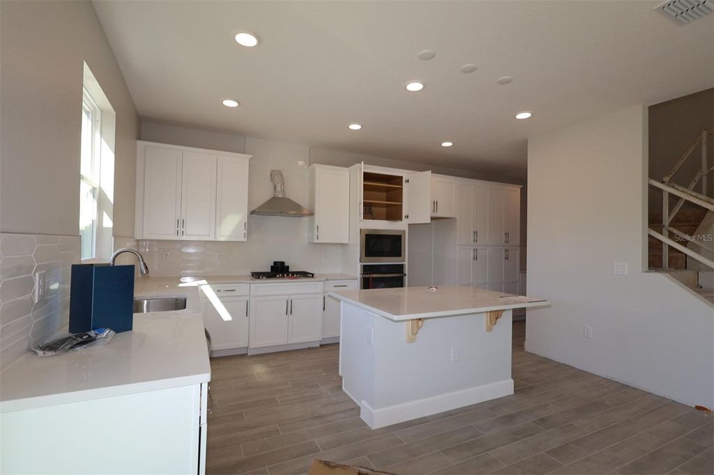 Photo of 720 Pointe Emerson Boulevard, Apopka, FL 32703 (MLS # O6330394)