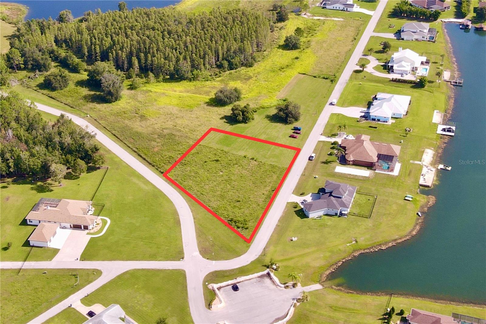 Outlaw Ridge offers seven spacious residential lots ranging from 1 to 1.88 acres, nestled within a private, gated community designed for custom-built homes. Located in a quiet and scenic setting, the community offers a peaceful atmosphere surrounded by nature
and is ideal for those seeking a quiet lifestyle.
The available lots include a mix of wetlands and floodplain areas. Many of the sites back up to wooded areas or designated conservation land, offering serene views and privacy. Utilities are well and septic.
The lots are located within Outlaw Ridge, a gated community, on Outlaw Way and Hideout Trail in Land O' Lakes in Pasco County. Outlaw Ridge is situated on Ehren Cutoff. Ehren Cutoff connects US 41 to State Road 52.
The site is approximately 10 minutes from US Highway 41, where nearby medical shopping, and schools are located. Additionally, it's 1.6 miles from State Road 52, 5.9 miles from I-75, and 7.6 miles from the Suncoast Parkway. The area offers a mix of rural and urban surroundings. Due to its proximity to major thoroughfares, it's just a short commute from Wesley Chapel (20 minutes), Dade City (25 minutes), Brooksville (30 minutes), New Port Richey (40 minutes), Tampa International Airport (40 minutes), downtown Tampa (40 minutes), and downtown St. Petersburg (50 minutes).