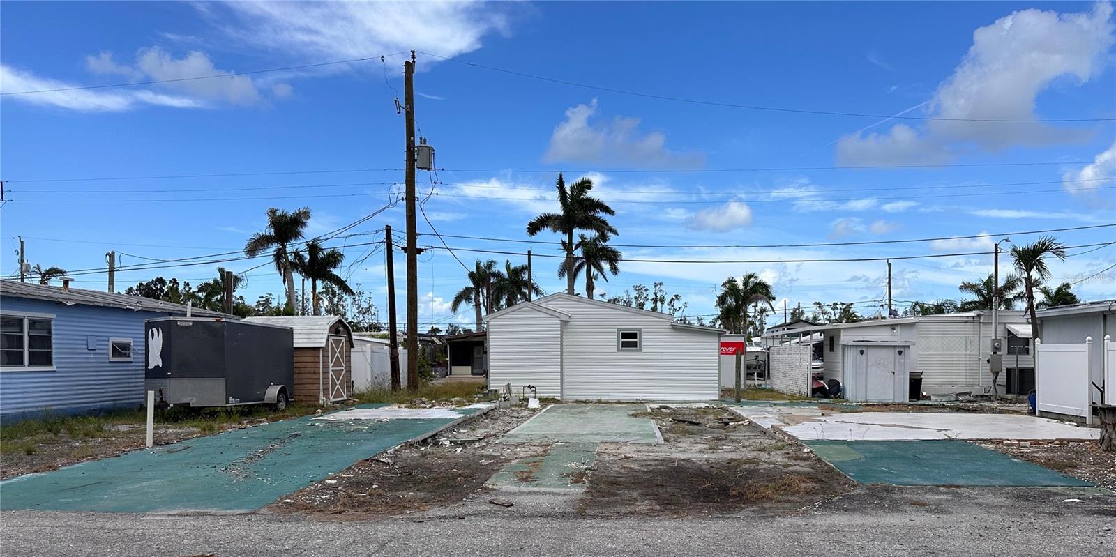 4125 sqft cleared vacant lot in Sunny Shores ready for your new mobile home!No rental,age,deed,pet restrictions, or lot rent. You own the land. Enjoy the community park on the Palma Sola Bay, clubhouse and shuffleboard.
