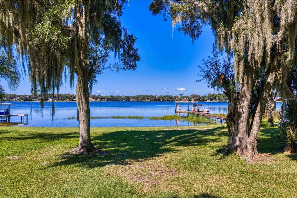Photo of 14748 Lake Magdalene Circle, Tampa, FL 33613 (MLS # TB8559253)