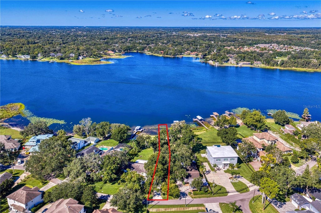 Photo of 14748 Lake Magdalene Circle, Tampa, FL 33613 (MLS # TB8559253)