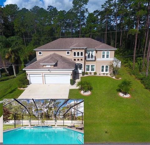 Photo of 4 Evans Drive, Palm Coast, FL 32164 (MLS # FC310605)